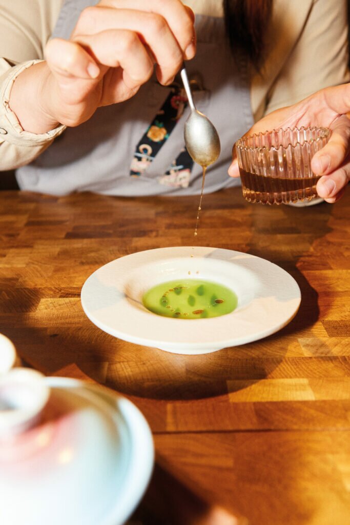 Chef Yeo adds the final touches to her celtuce sorbet.
